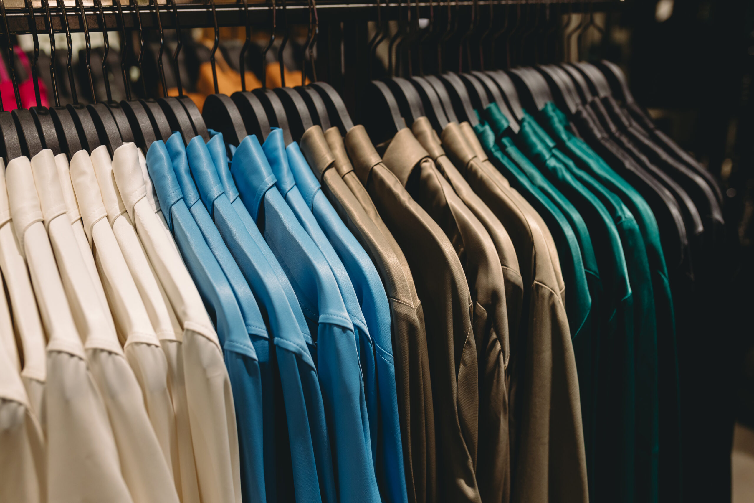 Row of clothes hanging on hangers
